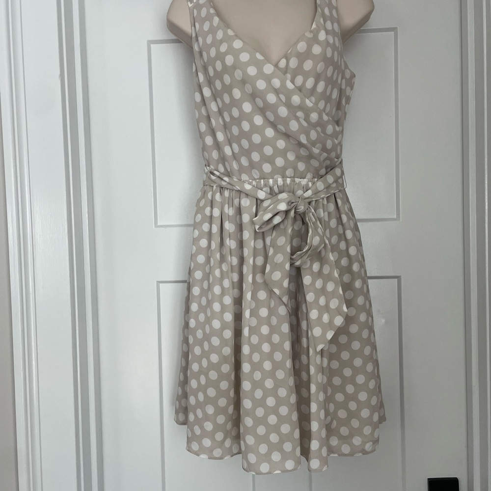 Express tan and white polka dot Sleeveless Wrap Mini Dress